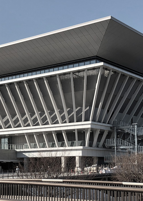 The 1964 Olympics Yoyogi National Gymnasium and 2020 Olympics Tokyo Aquatics Centre are featured by Reuters.